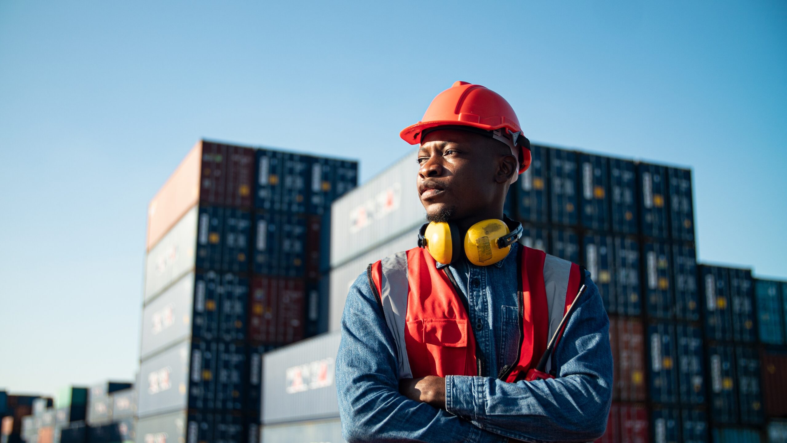 Black,Foreman,Worker,Working,At,Container,Cargo,Harbor,Holding,Walkie-talkie