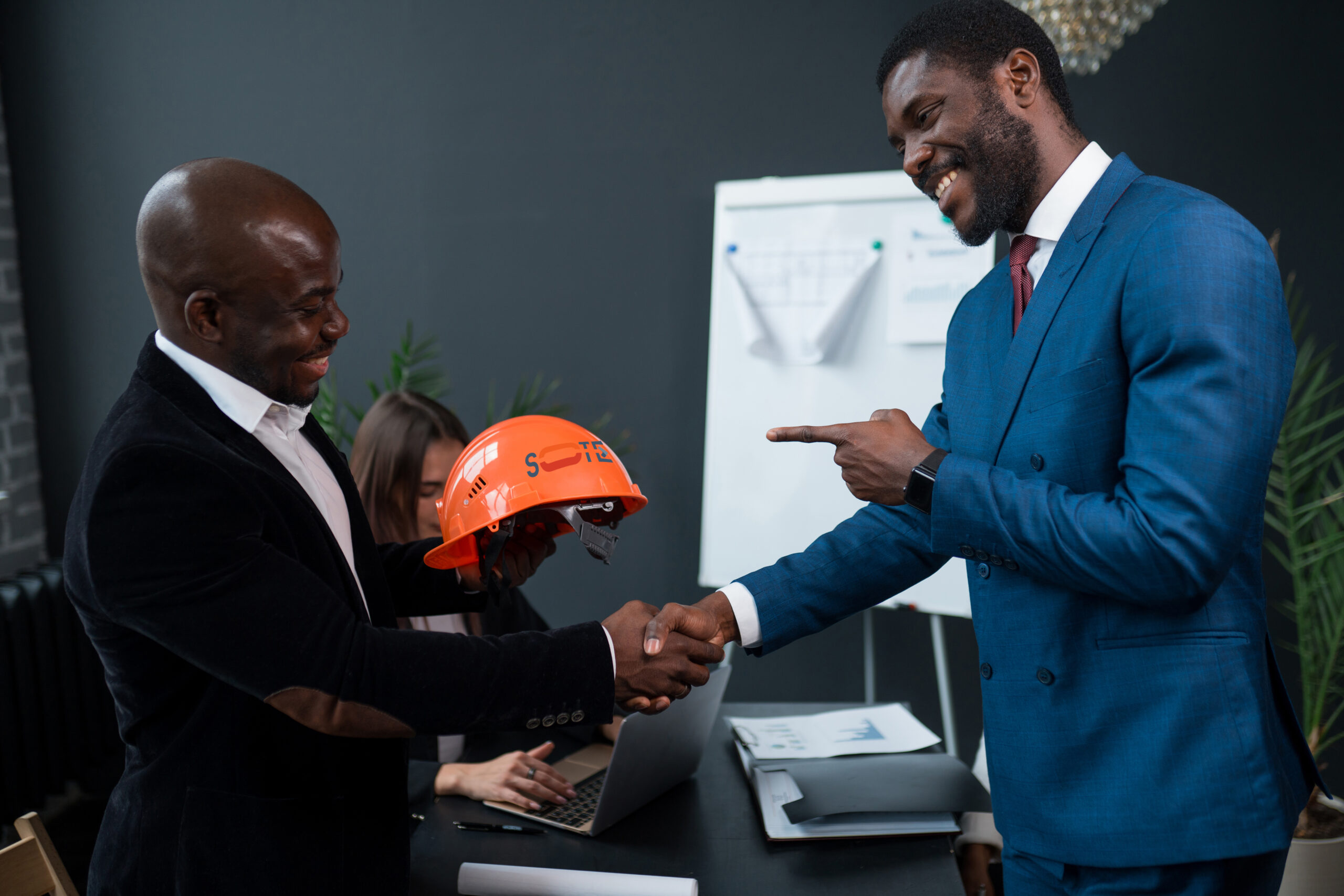 Photo,From,The,Side.,African,American,Businessmen,Shake,Hands,In